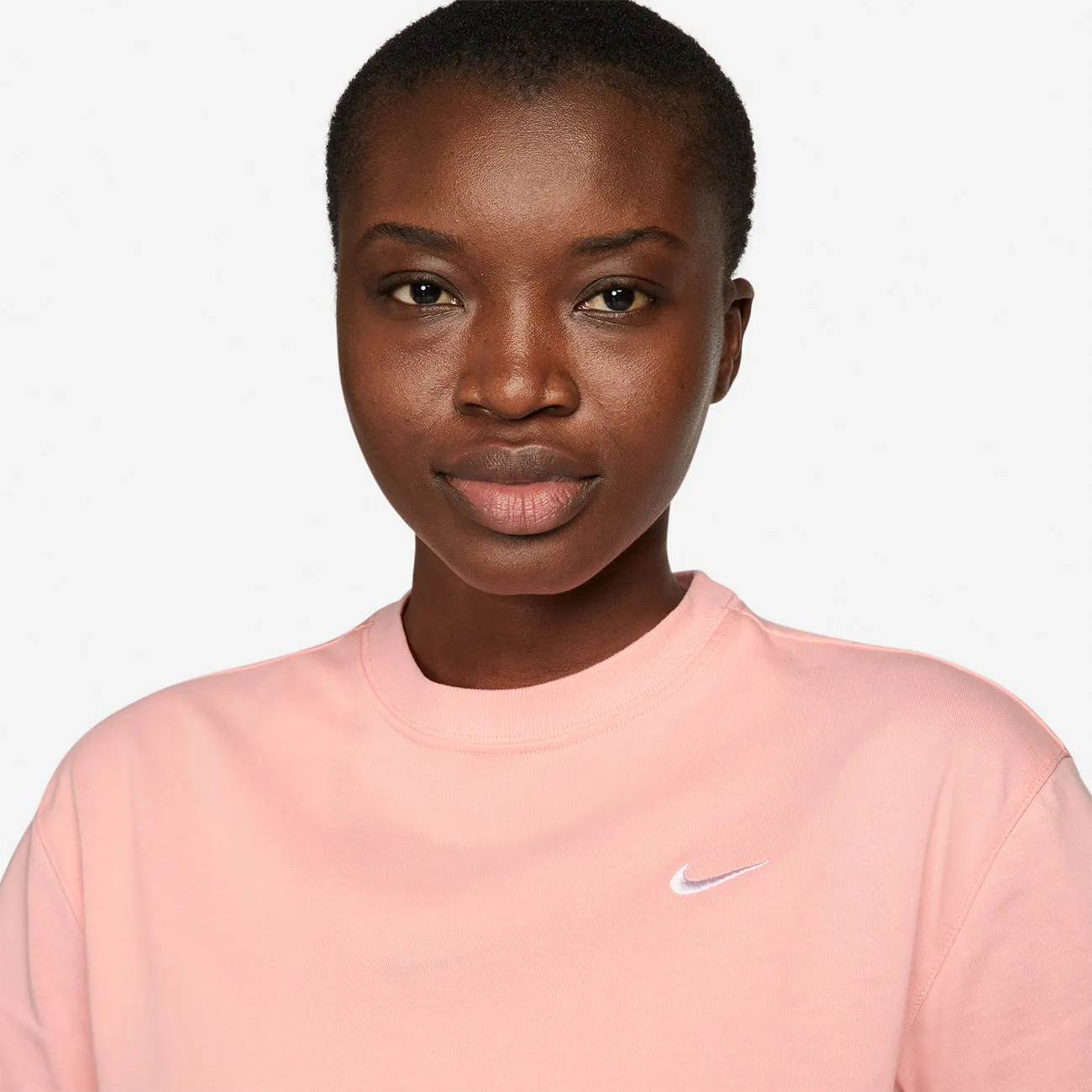 W NRG SOLOSWOOSH SS TEE BLEACHED CORAL WHITE