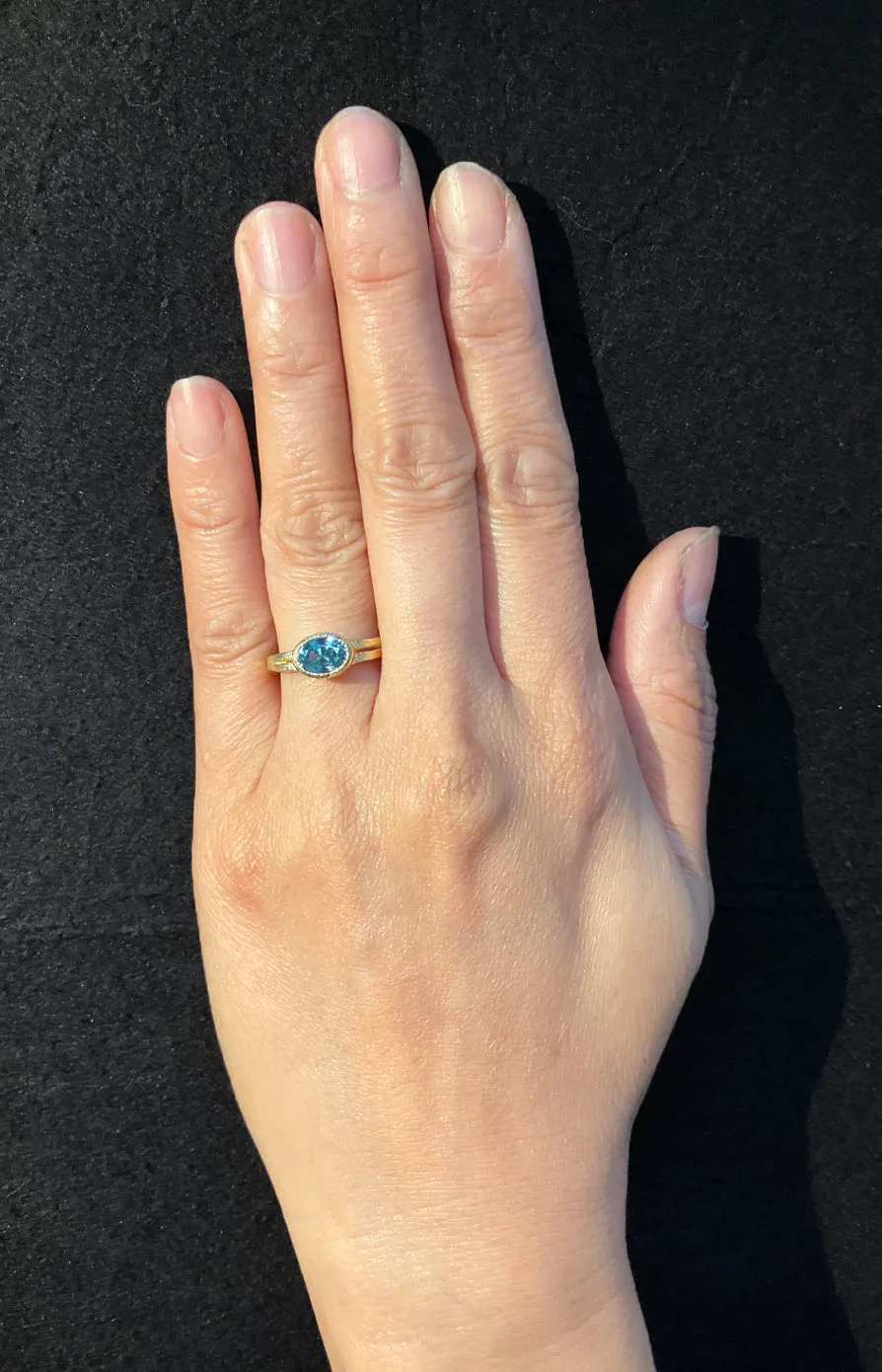 Wave and Edge Oval Blue Zircon Ring